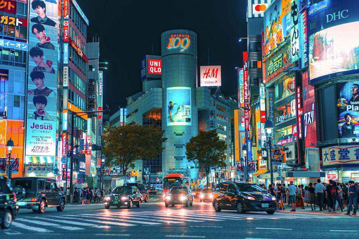 Neon street crossing at night