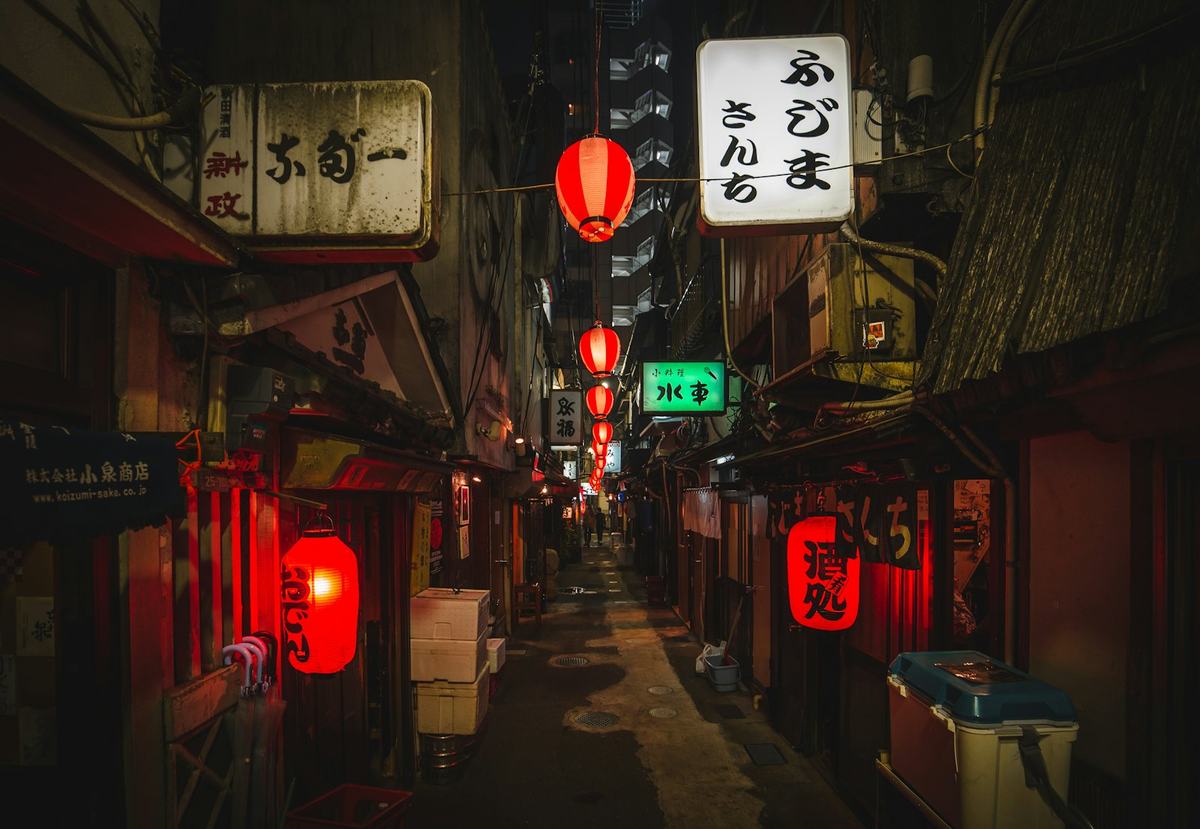 Lantern-lit alley in Tokyo at night